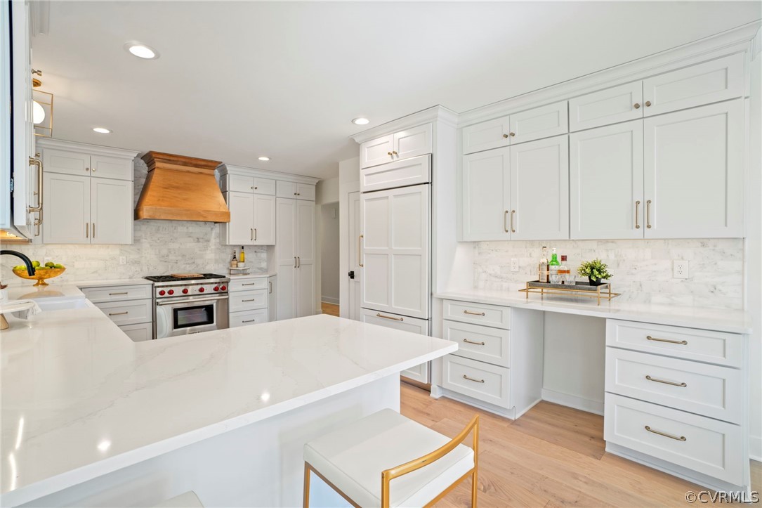 200 North Ridge Road Henrico, VA 23229 - Photo 11 of 48 a kitchen with granite countertop a stove a sink and a refrigerator