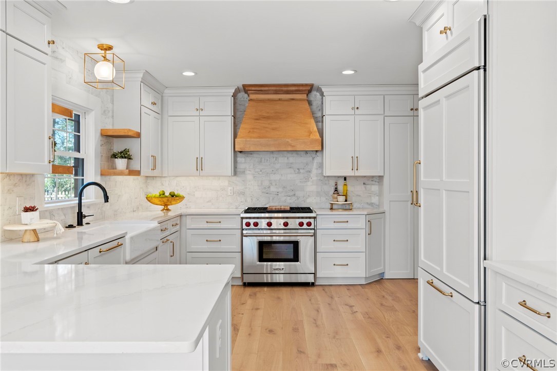 200 North Ridge Road Henrico, VA 23229 - Photo 12 of 48 a kitchen with stainless steel appliances granite countertop a sink a stove and a refrigerator