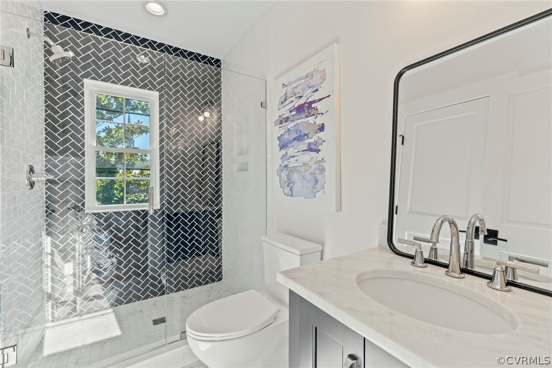 200 North Ridge Road Henrico, VA 23229 - Photo 21 of 48 a bathroom with a sink toilet and shower