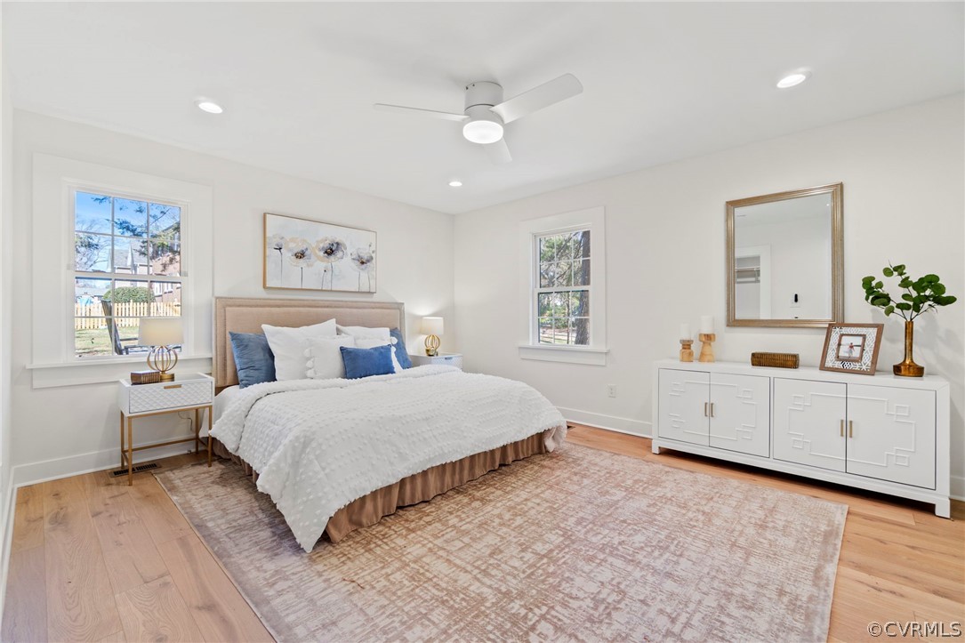 200 North Ridge Road Henrico, VA 23229 - Photo 23 of 48 a bedroom with a white bed and dresser with window