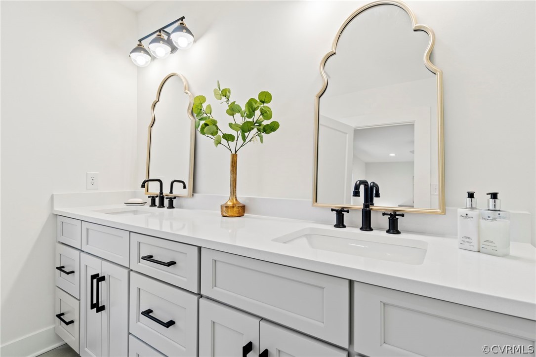 200 North Ridge Road Henrico, VA 23229 - Photo 25 of 48 a bathroom with sink and mirror