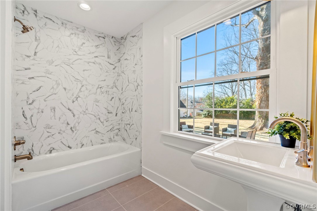 200 North Ridge Road Henrico, VA 23229 - Photo 28 of 48 a bathroom with a bathtub and next to a window