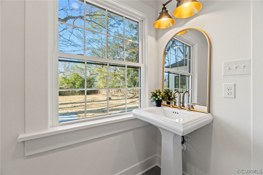 200 North Ridge Road Henrico, VA 23229 - Photo 29 of 48 a bathroom with a sink and a mirror