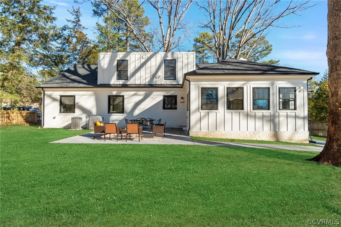 200 North Ridge Road Henrico, VA 23229 - Photo 44 of 48 a front view of a house with a garden and yard