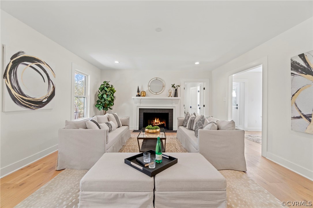 200 North Ridge Road Henrico, VA 23229 - Photo 9 of 48 a living room with furniture a window and a fireplace