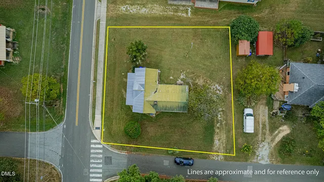 an aerial view of a house with outdoor space swimming pool and lake view