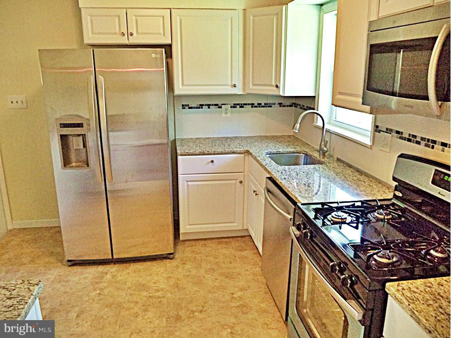 12904 Neola Road Silver Spring, MD 20906 - Photo 1 of 30 ALL-NEW GORGEOUS GRANITES*CERAMICS*STNLSS-STL*NEW