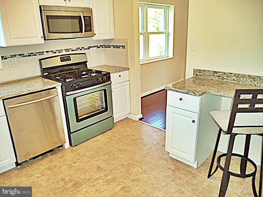 12904 Neola Road Silver Spring, MD 20906 - Photo 4 of 30 BREAKFAST-BAR-GRANITE and CLEAN !
