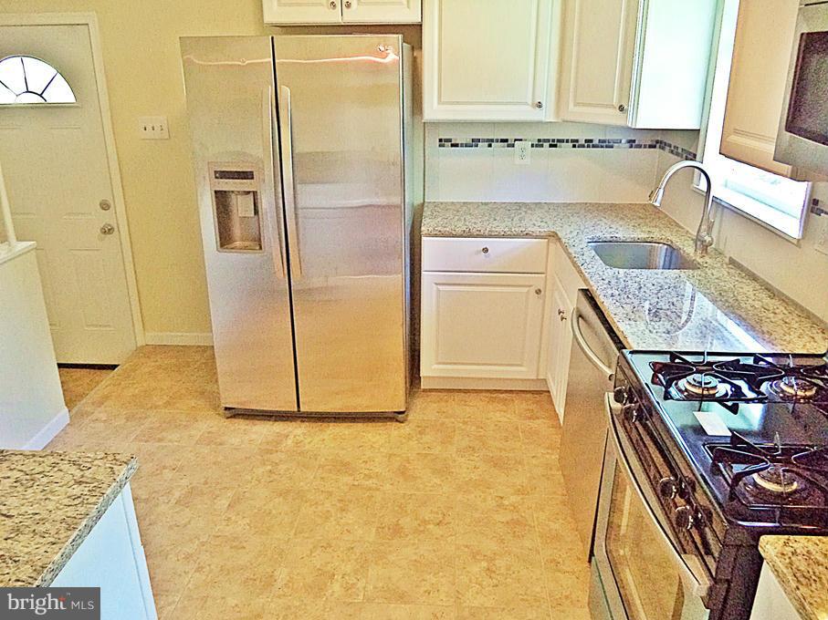12904 Neola Road Silver Spring, MD 20906 - Photo 7 of 30 ALL-NEW GORGEOUS GRANITES*CERAMICS*STNLSS-STL*NEW