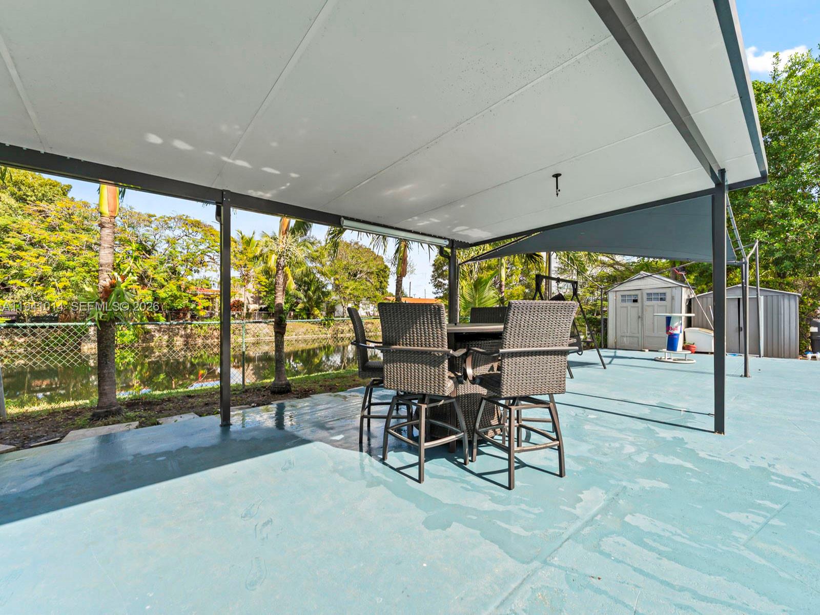 12301 Southwest 28th Street Miami, FL 33175 - Photo 27 of 46 a outdoor space with chairs