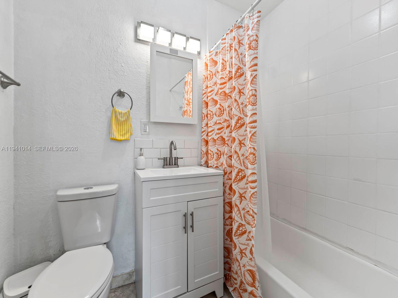 12301 Southwest 28th Street Miami, FL 33175 - Photo 34 of 46 a bathroom with a toilet sink and shower