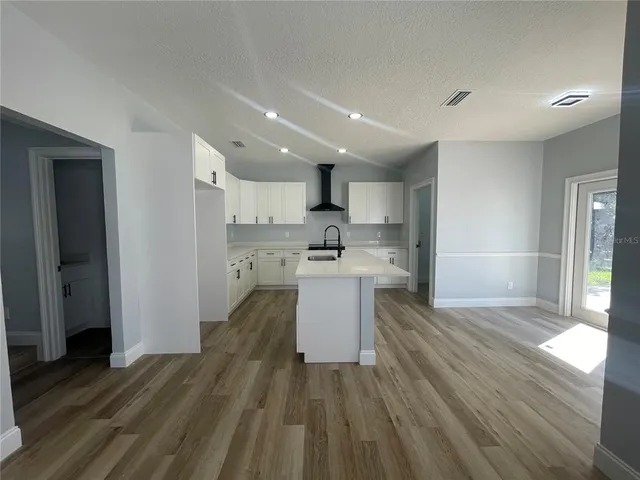 a bathroom with a bathtub and a toilet