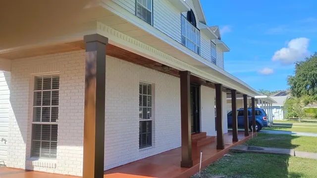a view of a building with a porch