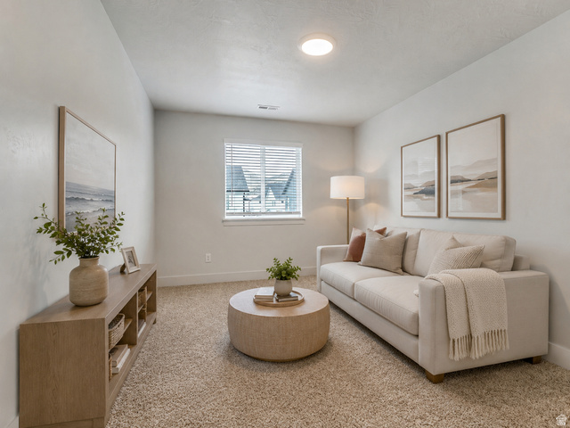 4572 Flower Point Eagle Mountain, UT 84005 - Photo 27 of 62 Carpeted living space with a window featuring horizontal blinds