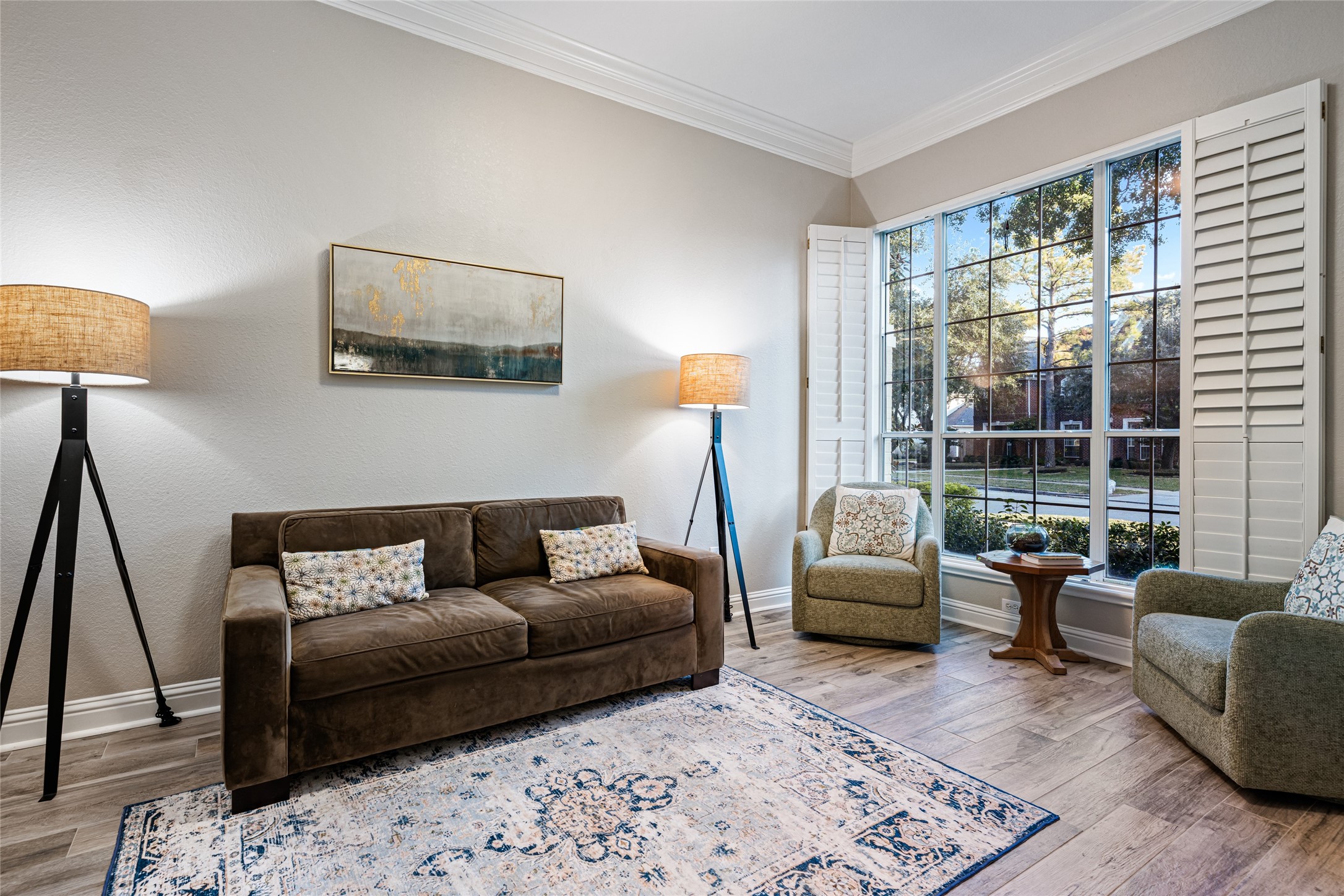 22806 2 Rivers Lane Katy, TX 77450 - Photo 16 of 49 The private study is accented by custom plantation shutters that provide beautiful natural light, privacy, and timeless architectural detail-an ideal setting for a home office, library, homeschool space or comfortable flex space. Bright and inviting multipurpose room with large windows allowing plenty of natural light.