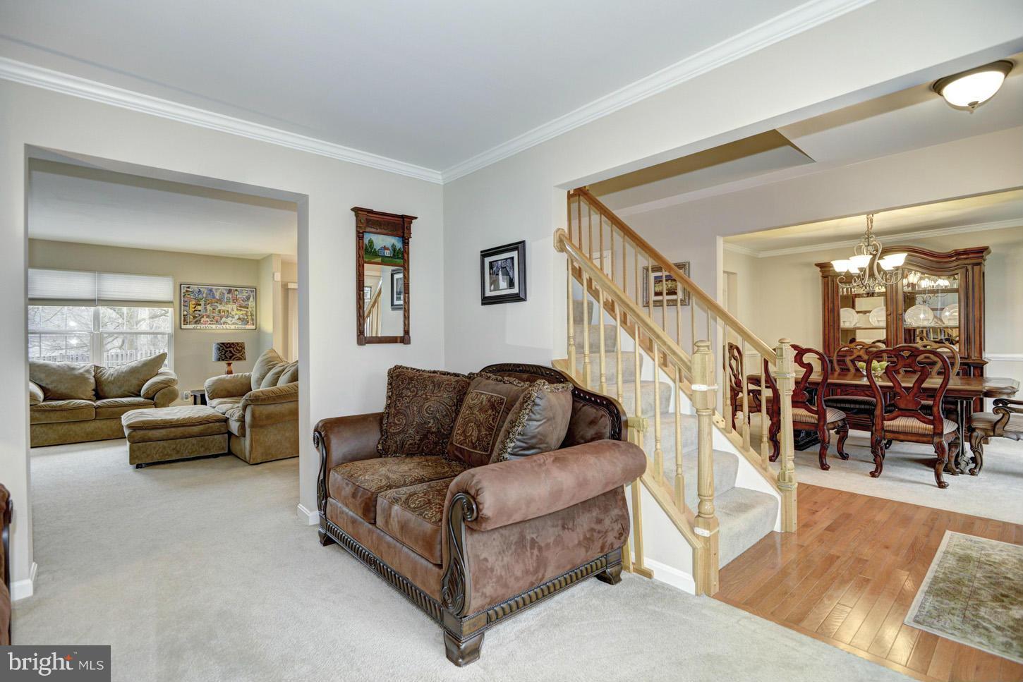 9522 Rommel Drive Columbia, MD 21046 - Photo 13 of 30 a living room with furniture and a glass door