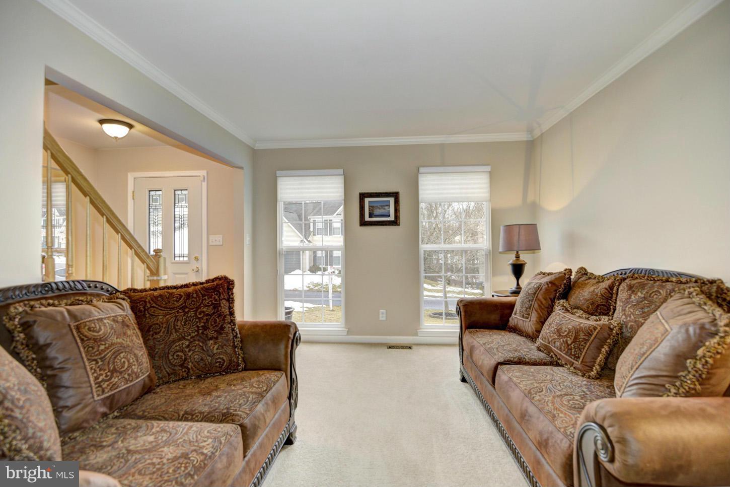 9522 Rommel Drive Columbia, MD 21046 - Photo 14 of 30 a living room with furniture and a large window