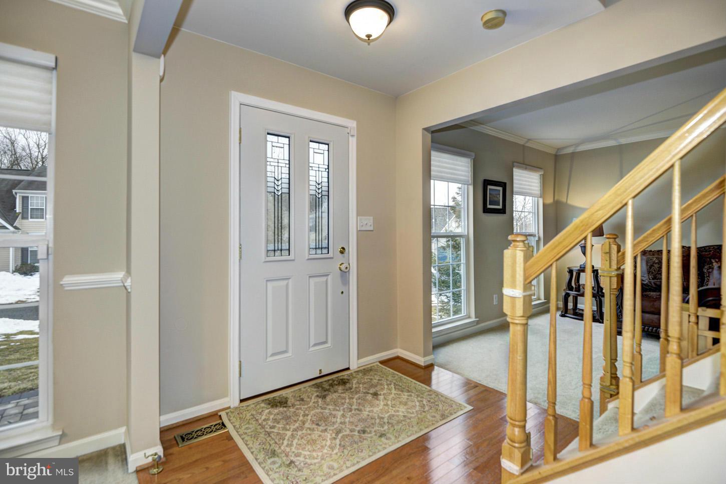 9522 Rommel Drive Columbia, MD 21046 - Photo 15 of 30 a view of an entryway with wooden floor