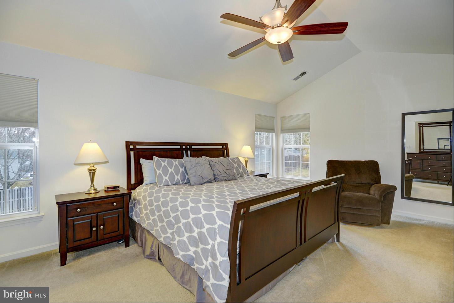 9522 Rommel Drive Columbia, MD 21046 - Photo 17 of 30 a bedroom with a bed dresser and a window