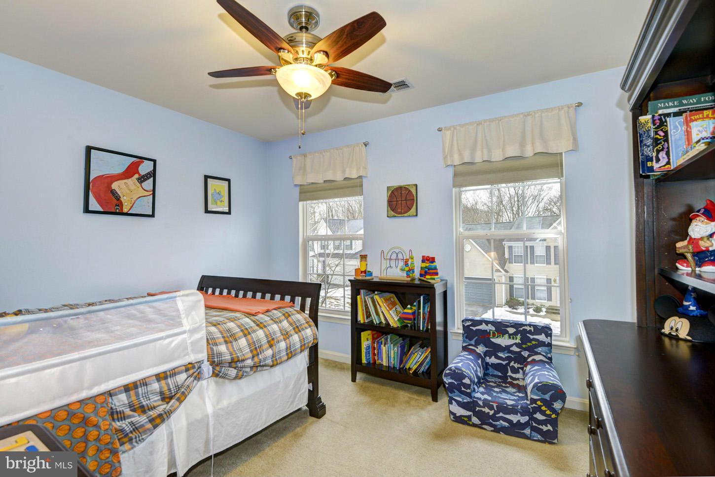 9522 Rommel Drive Columbia, MD 21046 - Photo 21 of 30 a bedroom with a bed and a window