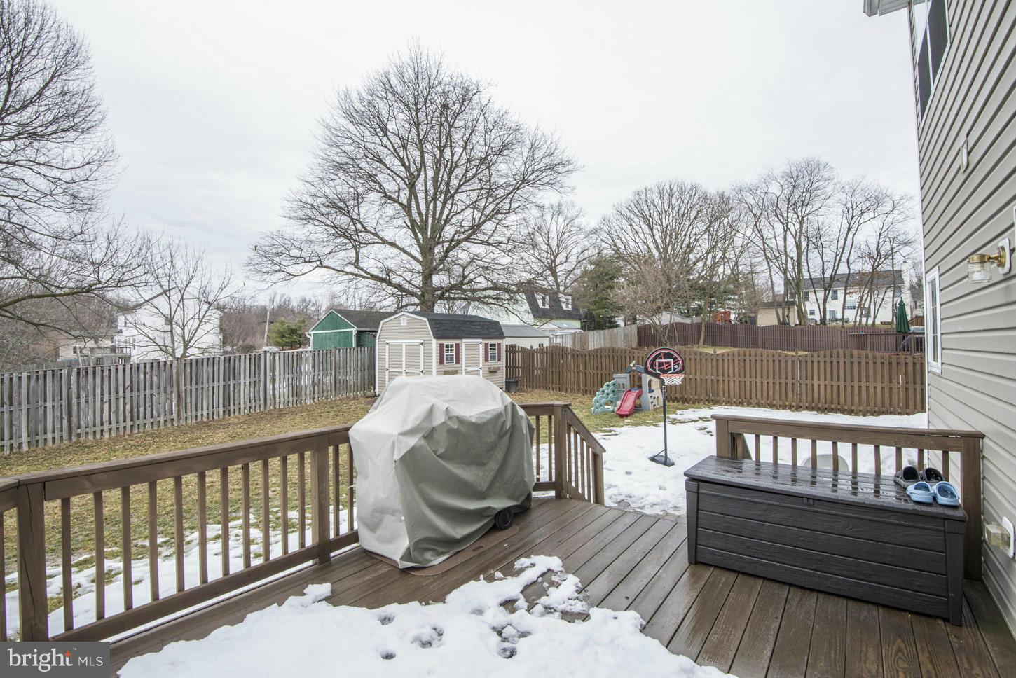 9522 Rommel Drive Columbia, MD 21046 - Photo 29 of 30 a view of a wooden deck with furniture