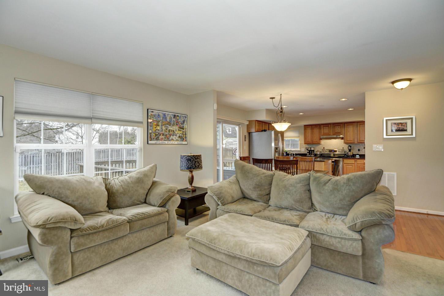 9522 Rommel Drive Columbia, MD 21046 - Photo 10 of 30 a living room with furniture and a large window