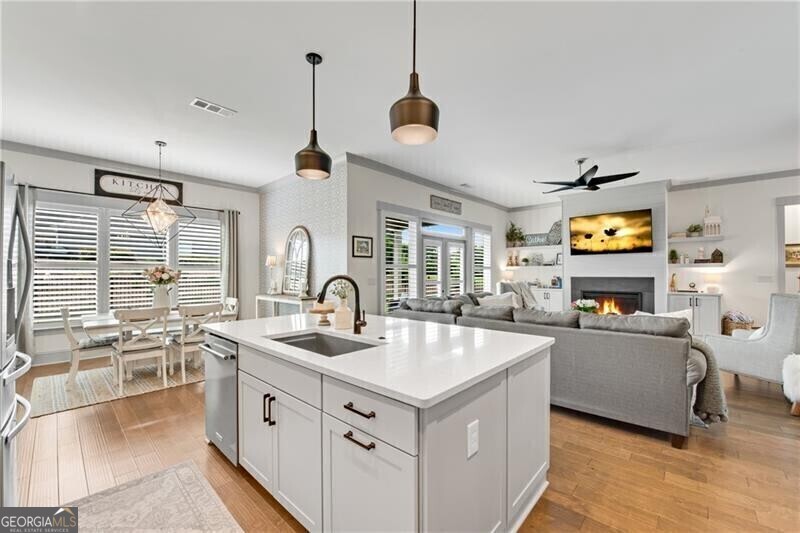 485 Delaperriere Loop Jefferson, GA 30549 - Photo 19 of 69 a kitchen with counter top space and a sink