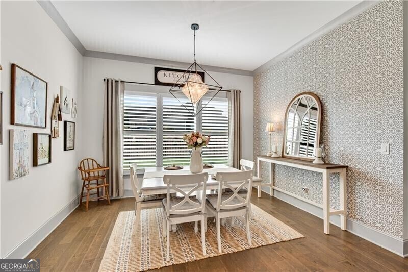 485 Delaperriere Loop Jefferson, GA 30549 - Photo 20 of 69 a view of a dining room with furniture window and wooden floor