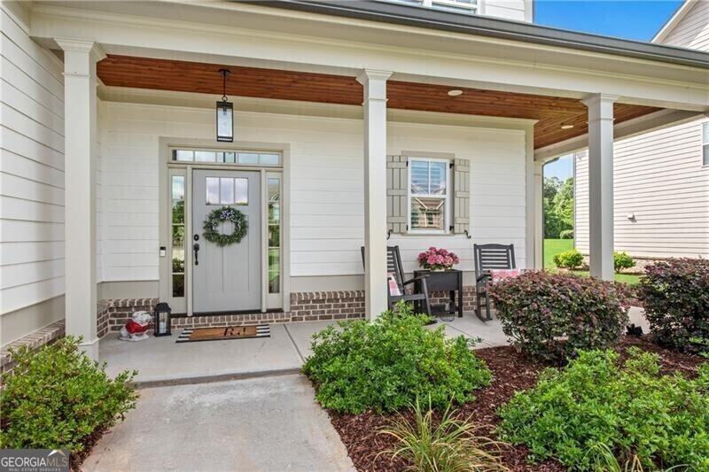 485 Delaperriere Loop Jefferson, GA 30549 - Photo 2 of 69 a front view of a house with garden