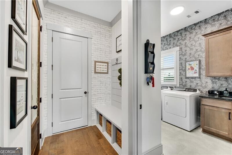 485 Delaperriere Loop Jefferson, GA 30549 - Photo 21 of 69 a bathroom with a sink a toilet and shower