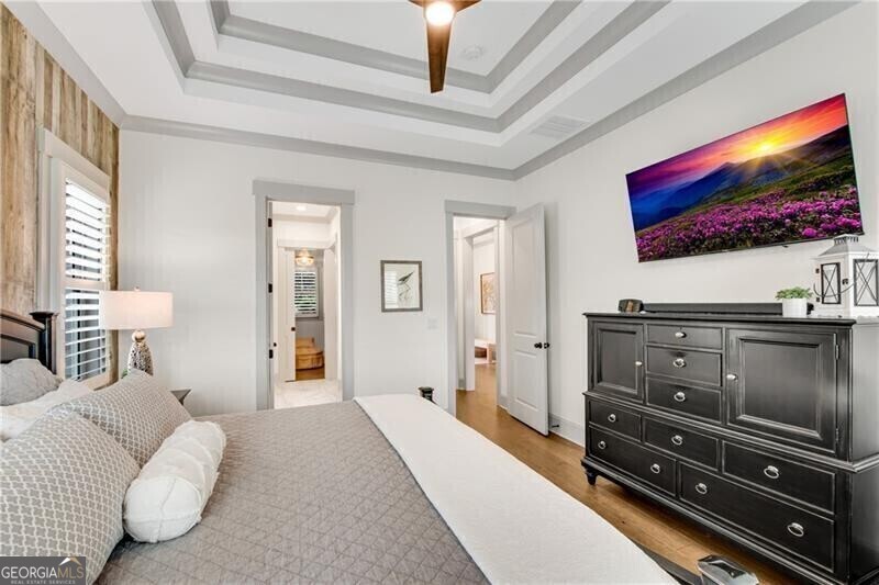 485 Delaperriere Loop Jefferson, GA 30549 - Photo 27 of 69 a living room with furniture and a flat screen tv