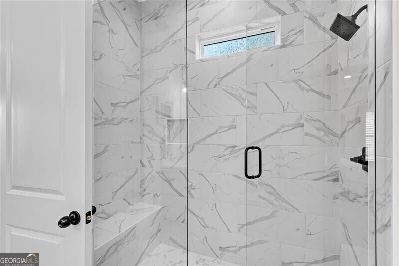 485 Delaperriere Loop Jefferson, GA 30549 - Photo 30 of 69 a bathroom with a shower