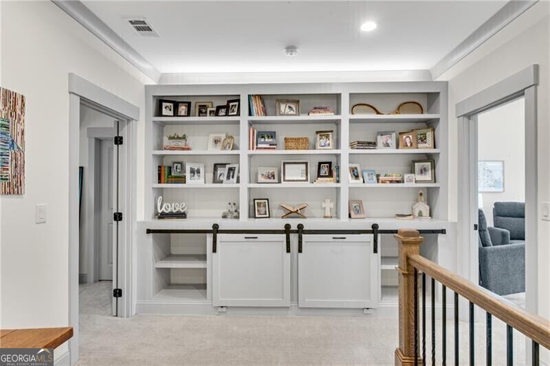 485 Delaperriere Loop Jefferson, GA 30549 - Photo 35 of 69 a view of a livingroom with furniture and staircase