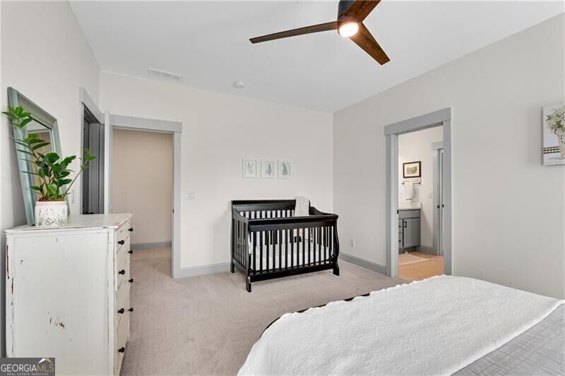 485 Delaperriere Loop Jefferson, GA 30549 - Photo 38 of 69 a bedroom with a bed and a window