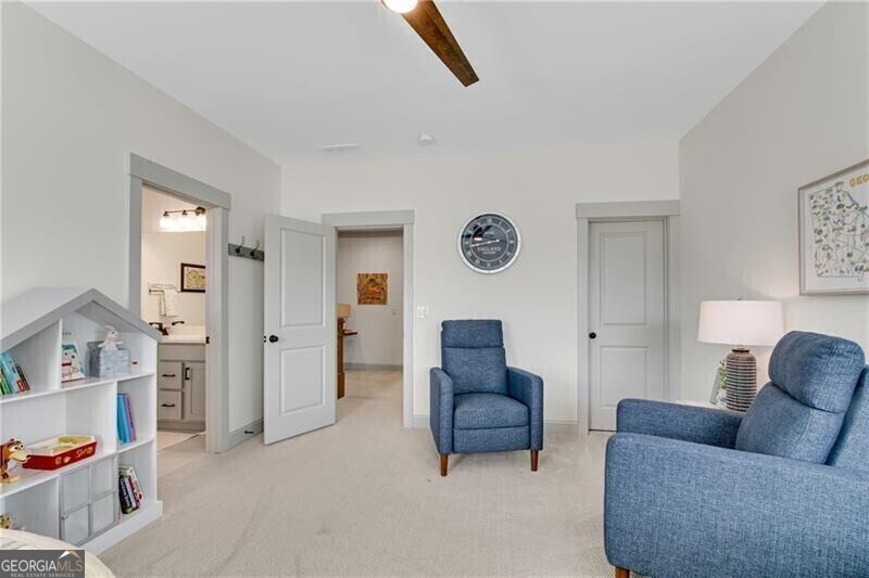 485 Delaperriere Loop Jefferson, GA 30549 - Photo 43 of 69 a living room with furniture and a window