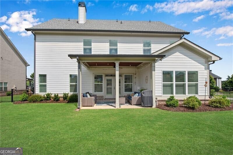 485 Delaperriere Loop Jefferson, GA 30549 - Photo 8 of 69 front view of a house with a yard