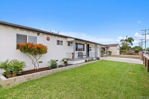 a house view with a garden space