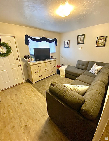 640 East 600 North Logan, UT 84321 - Photo 4 of 20 Living room featuring wood finished floors
