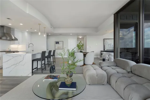 a bathroom with double sink and a mirror
