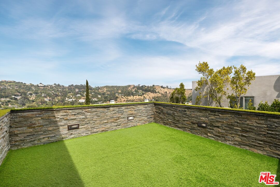 2437 Apollo Drive Los Angeles, CA 90046 - Photo 22 of 27 a view of a lake with a city