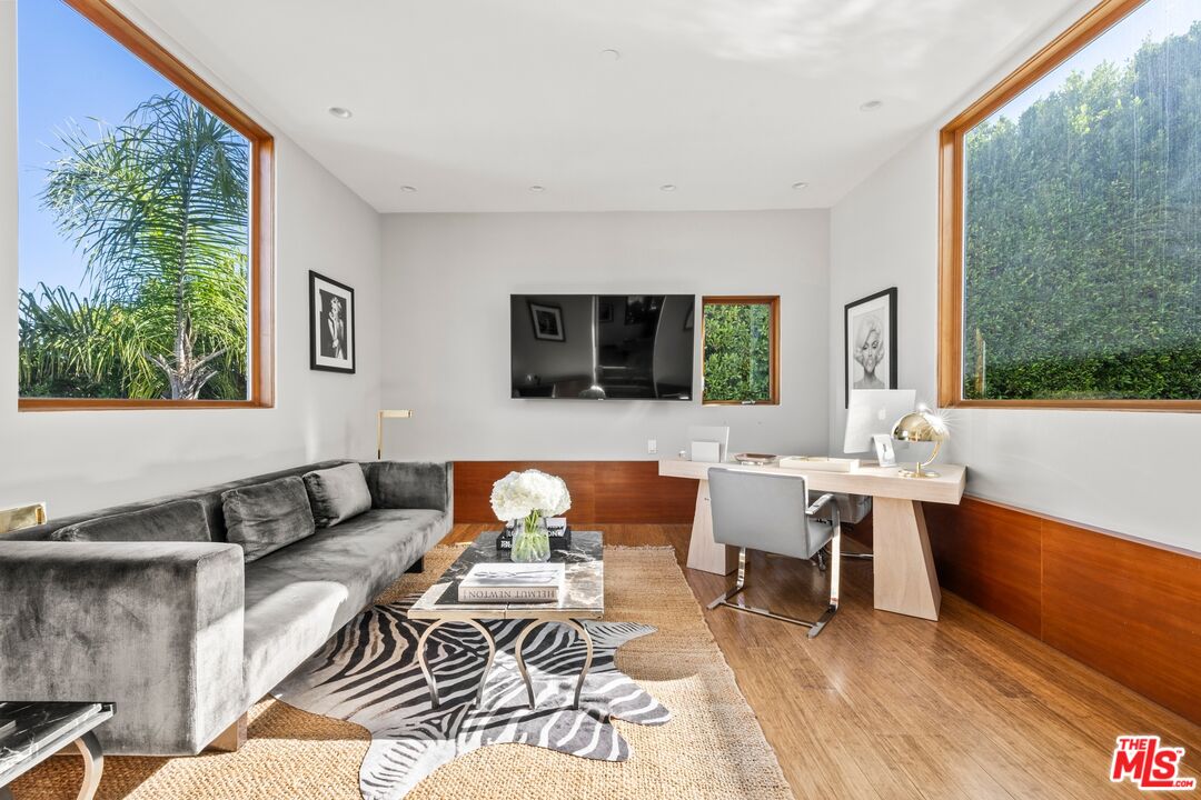 2437 Apollo Drive Los Angeles, CA 90046 - Photo 3 of 27 a living room with furniture and a flat screen tv