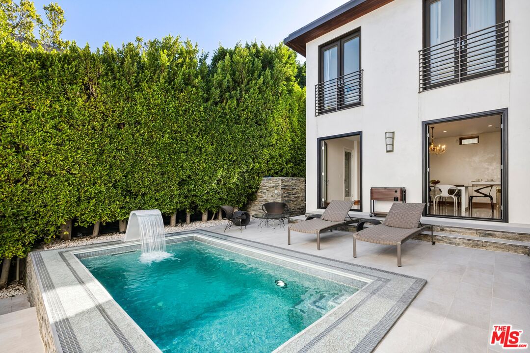 2437 Apollo Drive Los Angeles, CA 90046 - Photo 7 of 27 a view of a house with backyard sitting area and swimming pool