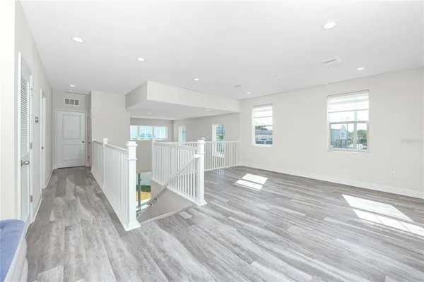 a view of livingroom with furniture and wooden floor