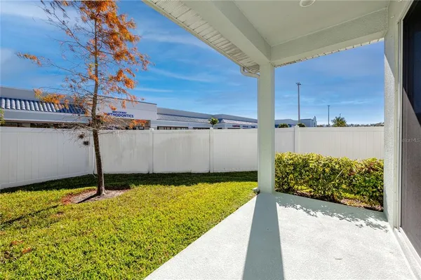 a room with a bed and a window