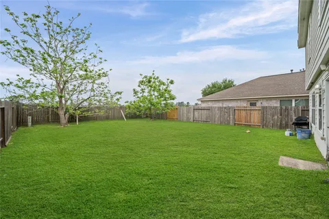 a view of a backyard with a garden