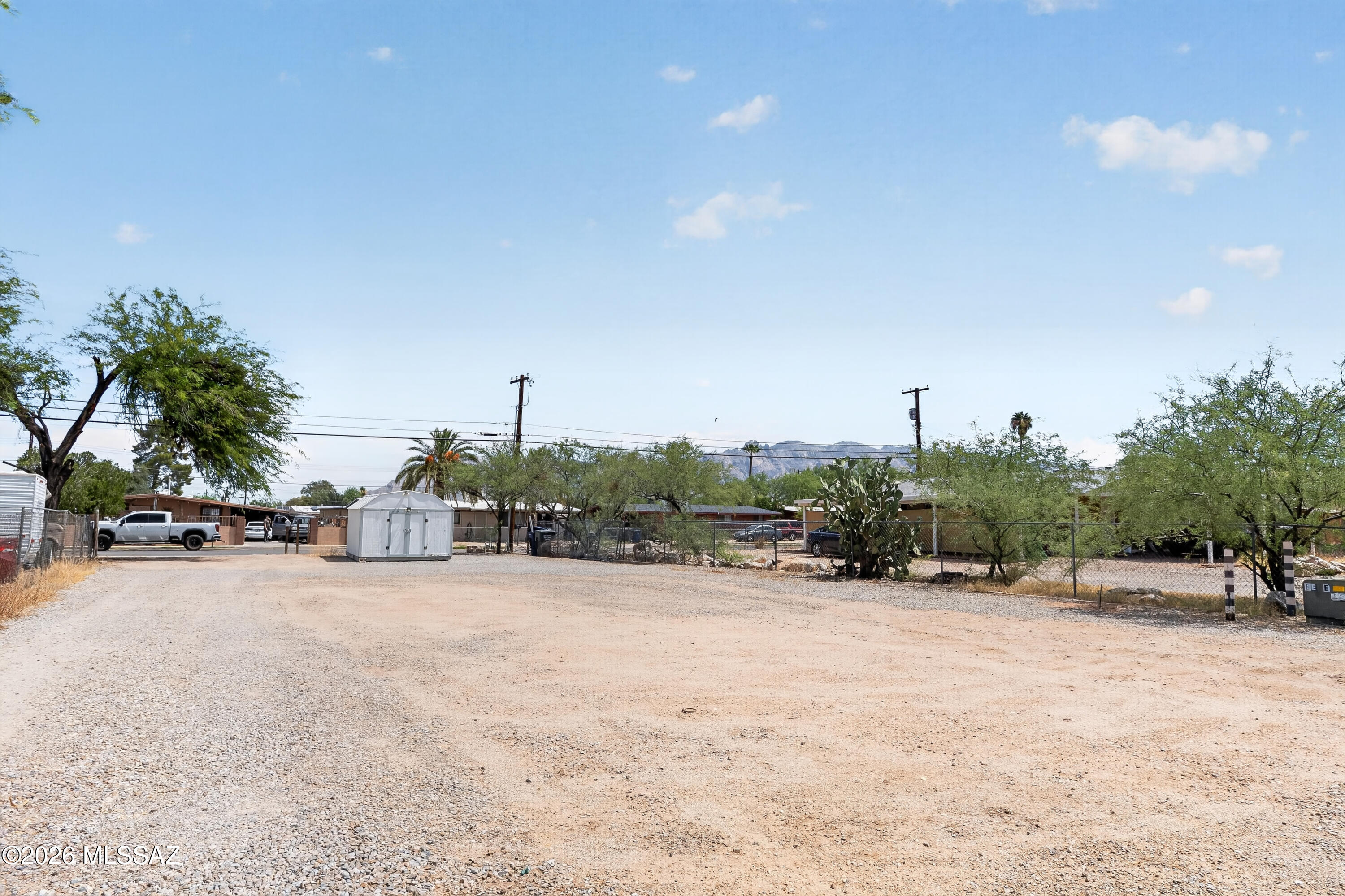 131 West Pastime Road Tucson, AZ 85705 - Photo 18 of 18 View of the street and mountains from the front of the home.