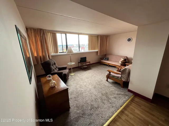 a room with furniture and a window