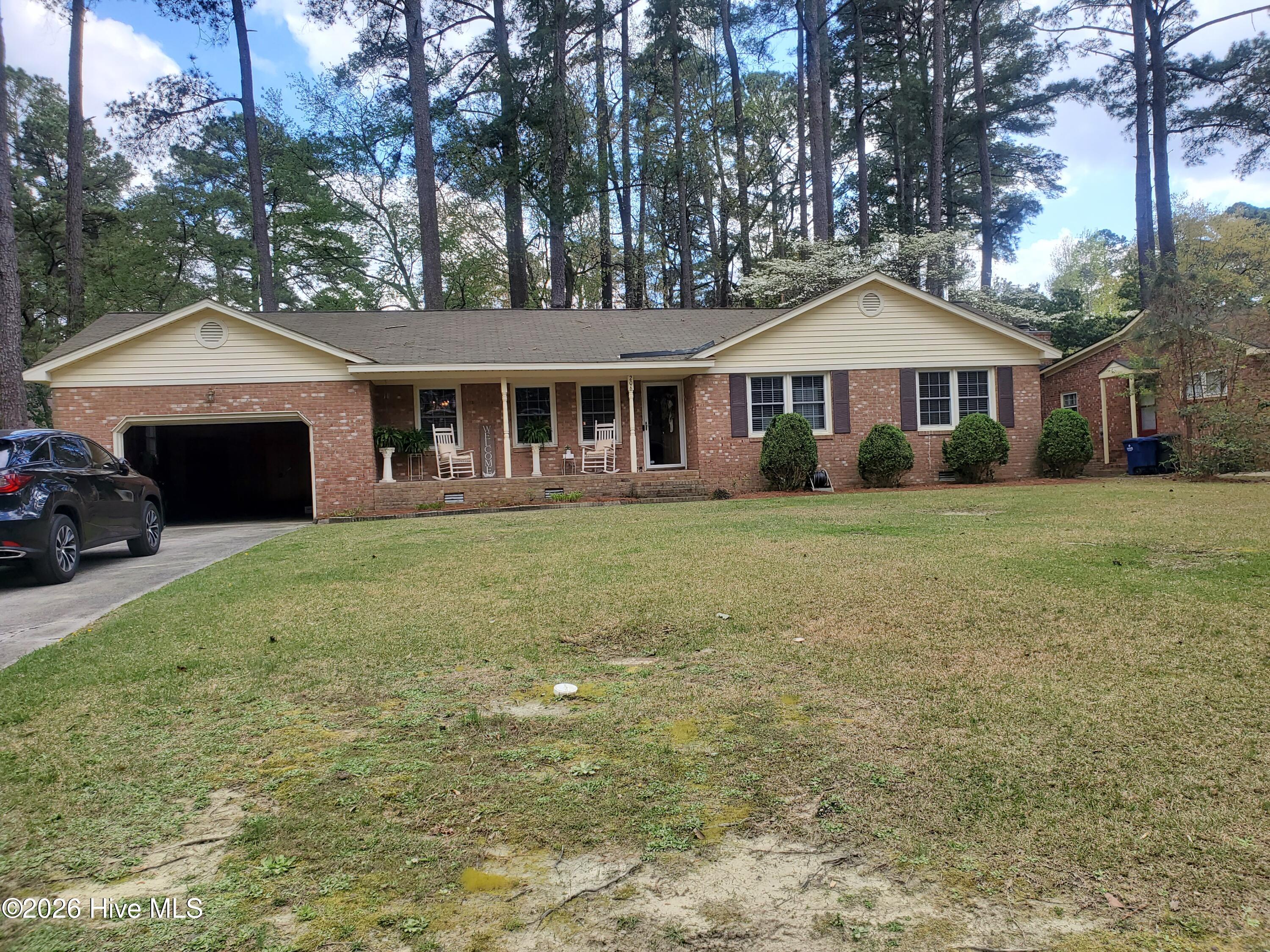 206 Staffordshire Road Greenville, NC 27834 - Photo 1 of 18 front of house with yard view