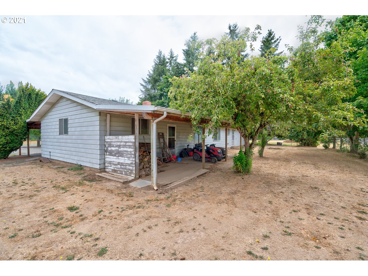 8530 South Barnards Road Canby, OR 97013 - Photo 6 of 22 a view of a house with a yard