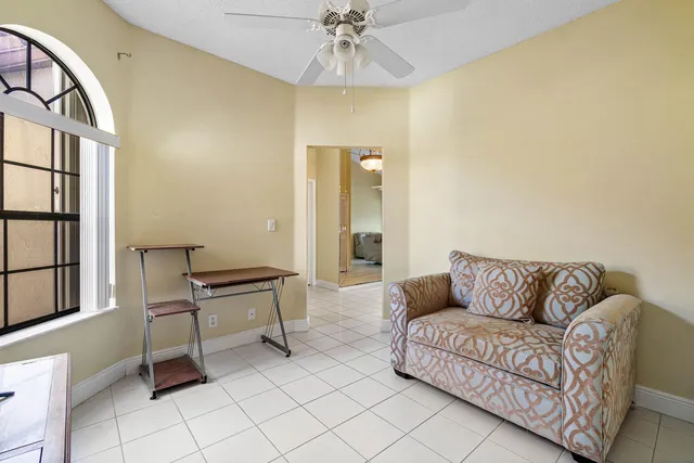 a bathroom with a shower and a curtain